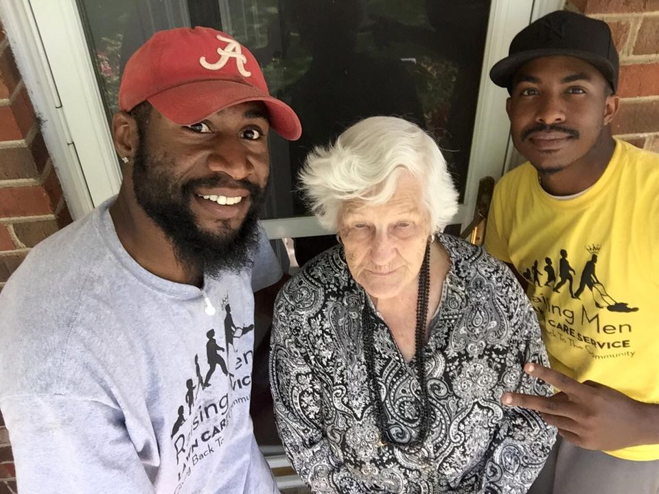 Two Men Help A 93YearOld Woman Struggling To Cut Her