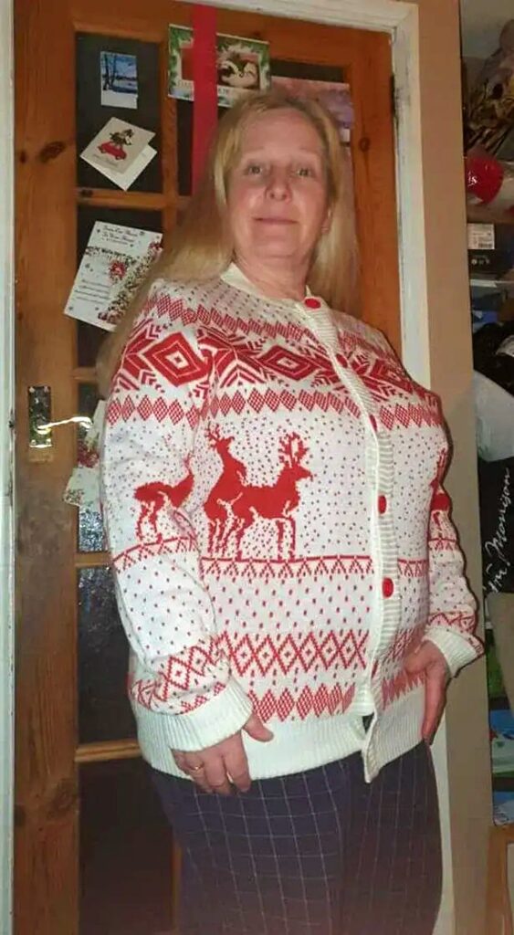 She posed in a Christmas sweater and had no idea why everyone was laughing at her.
